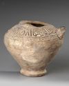 A SELJUK UNGLAZED MOULDED POTTERY VESSEL, PERSIA, 12TH-13TH CENTURY