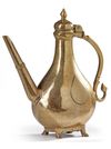 A MUGHAL ENGRAVED BRASS, INDIA, 18TH CENTURY