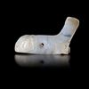 A NEAR EASTERN RECLINING FERRET OR STOAT, BANDED CHALCEDONY. 3rd.mil.B.C.