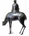 A LARGE CHINESE BRONZE CENSER MODELLED AS A DIGNITARY RIDING A DEER, MING DYNASTY (1368-1644)