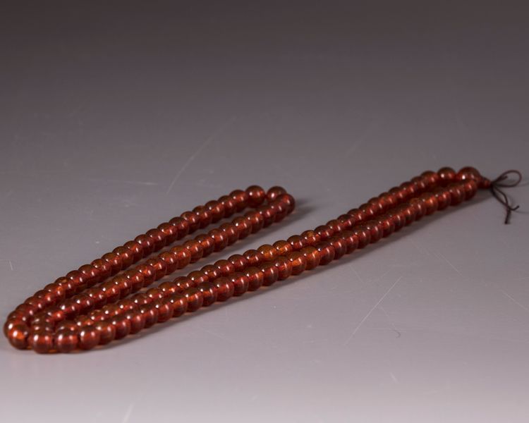 A Chinese amber rosary