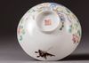 A pair of Chinese famille rose 'butterfly and flower' bowls
