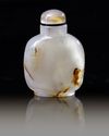 A CHINESE SHADOW AGATE 'LIU HAI' SNUFF BOTTLE