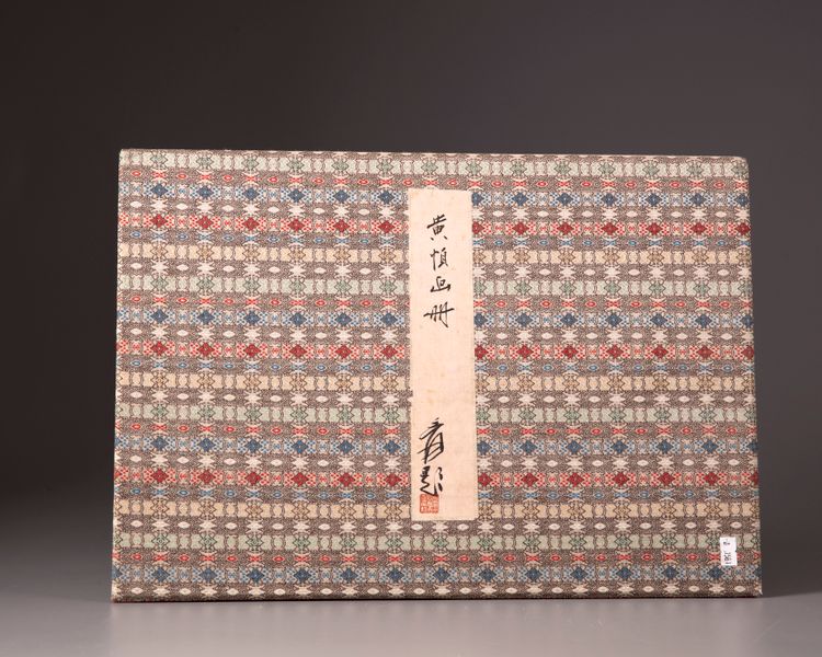 A large book with various paintings