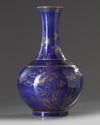 A Chinese blue-ground gilt decorated 'Three Friends of Winter' bottle vase