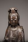 A large bronze figure of Guanyin