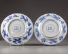 A pair of Chinese blue and white 'Eight Immortals' dishes
