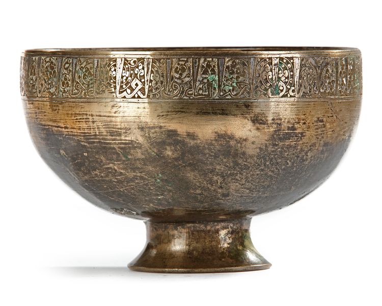A KHORASAN SILVER-INLAID BRONZE BOWL,  PERSIA, 13TH CENTURY