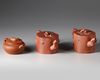 Three Chinese Yixing teapots and covers