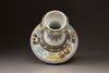 A polychrome porcelain vase
