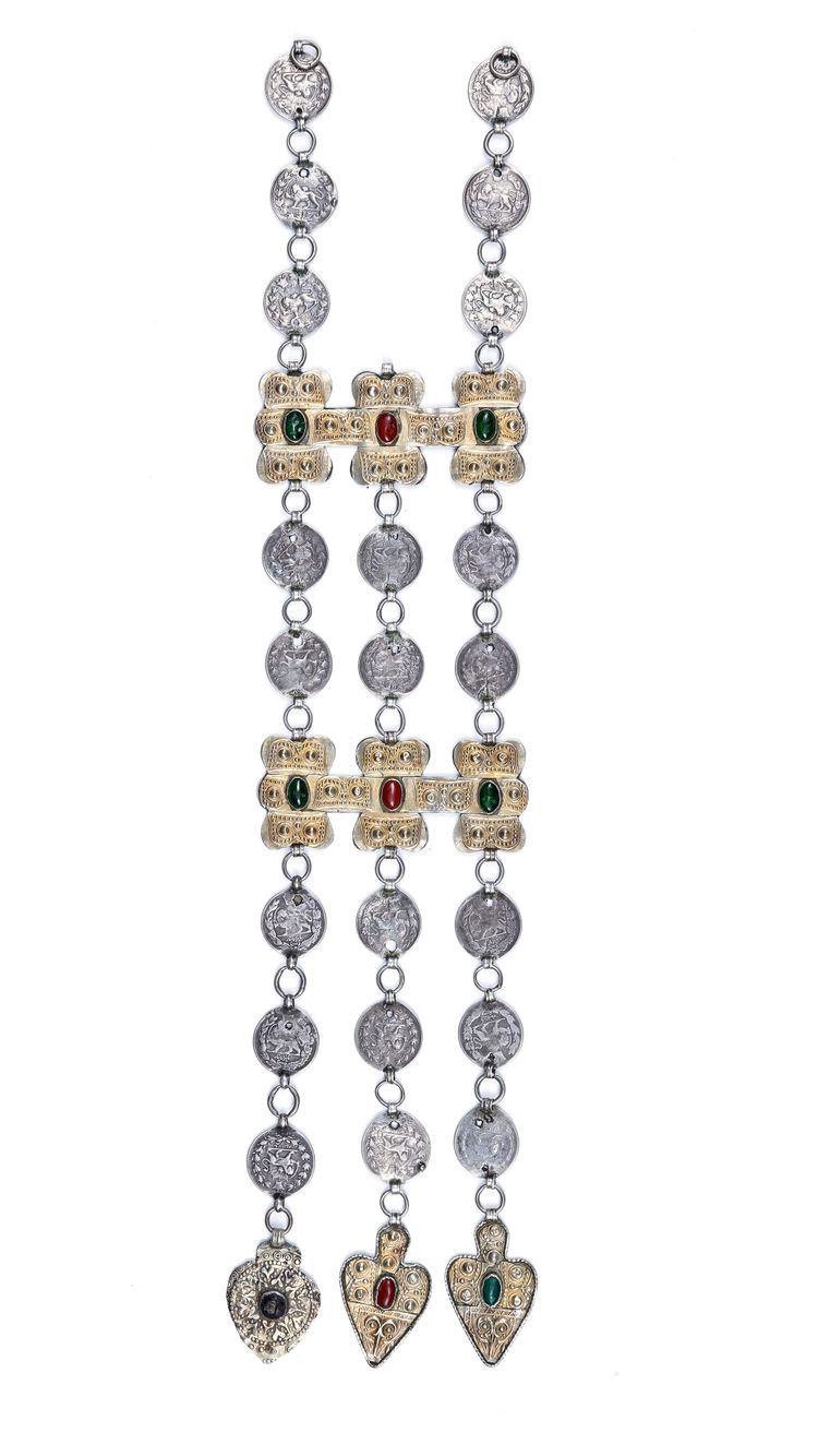 A SILVER COIN PENDANT, TURKMENISTAN, 19TH CENTURY