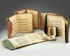 A GROUP OF FIVE CHINESE QURANS AND TWO KASHMIR QURANS