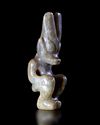 A GREENISH-YELLOW JADE OF A HUMANOID FIGURE, CHINA, HONGSHAN CULTURE