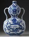 A Chinese blue and white double gourd moon flask