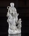 A CHINESE DEHUA GLAZED FIGURE OF GUANYIN AND A BOY, QING DYNASTY (1644-1911)