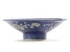 A CHINESE BLUE-GROUND SLIP DECORATED BOWL, 17TH CENTURY