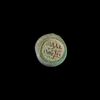 A FATIMID GLASS WEIGHT OF HALF DIRHAM, AL-HAKIM BI-AMR ALLAH (386AH-411AH/ 996AD-1021AD)