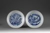 A pair of blue and white dishes