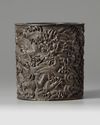 A Chinese zitan ‘dragon and waves’ brush pot, bitong