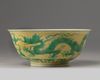 A Chinese yellow-ground green-enamelled eggshell porcelain 'dragon' bowl