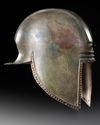 A GREEK BRONZE ILLYRIAN HELMET, CIRCA 6TH-5TH CENTURY B.C.
