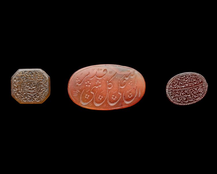 THREE PERSIAN AGATE AMULETS, QAJAR PERIOD