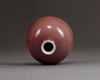 A Chinese peachbloom-glazed beehive-shaped water pot, taibaizun
