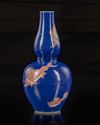 A Chinese blue ground double-gourd vase