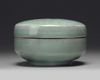 A Korean celadon-glazed ‘chrysanthemum’ round box and cover