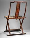 A FINE AND RARE HUANGHUALI FOLDING CHAIR, CHINA 17TH CENTURY