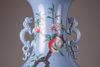 A large Chinese blue-ground famille rose vase