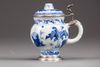 A Chinese blue and white mustard pot with European silver mounts