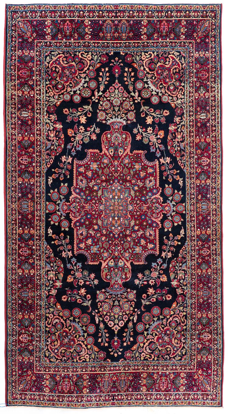 A KIRMAN RAWER RUG, 1910