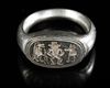 AN EGYPTIAN PALE ELECTRUM FINGER RING, NEW KINGDOM, CIRCA 16TH-11TH CENTURY B.C.