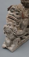 A rare set of two plain wooden corbels from Kyūshū with carved Chinese lions (karashishi)