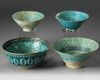 Four Islamic turquoise glazed bowls