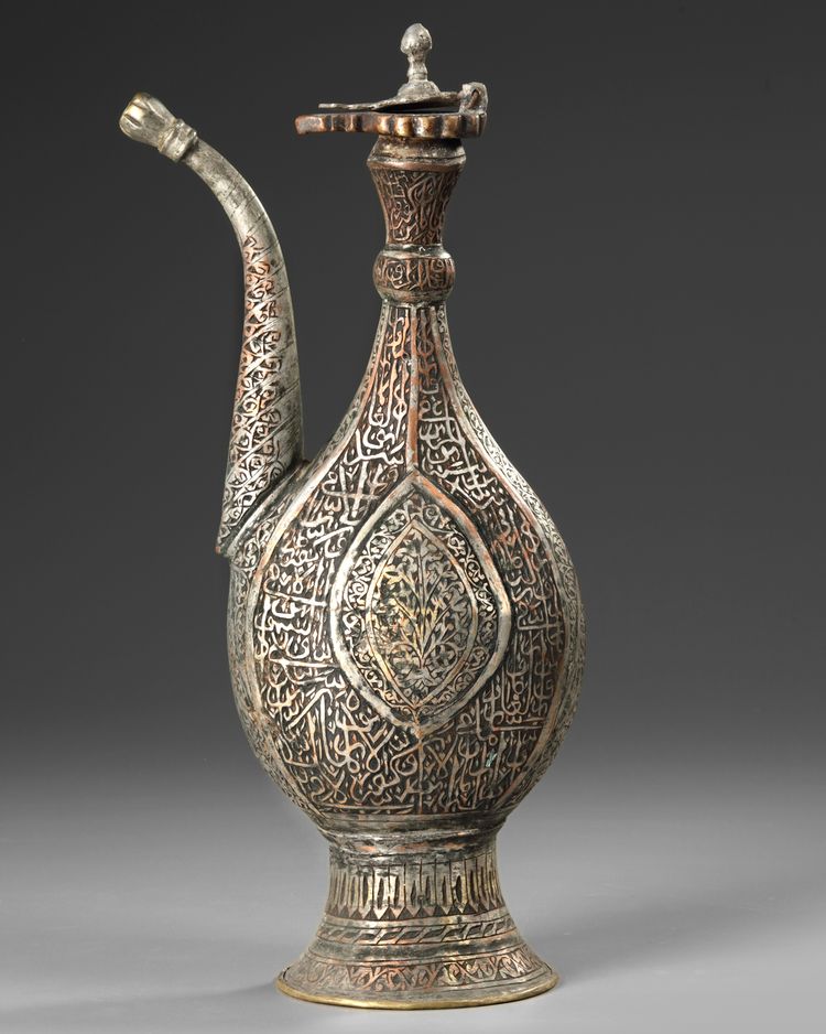 A COPPER INLAID ENGRAVED METAL EWER, 19TH-20TH CENTURY