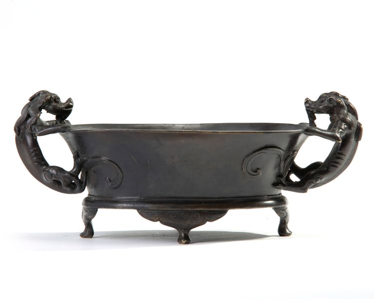 A Chinese bronze qilin-handled oval censer