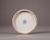 A Chinese blue and white circular inkstone