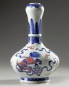 A Chinese copper-red-decorated blue and white garlic-head vase