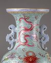 A CHINESE BLUE-GROUND FAMILLE ROSE 'DRAGONS' VASE