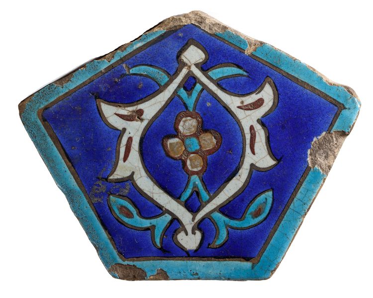 A SIX-SIDED TIMURID TILE, PERSIA,  MID-15TH CENTURY