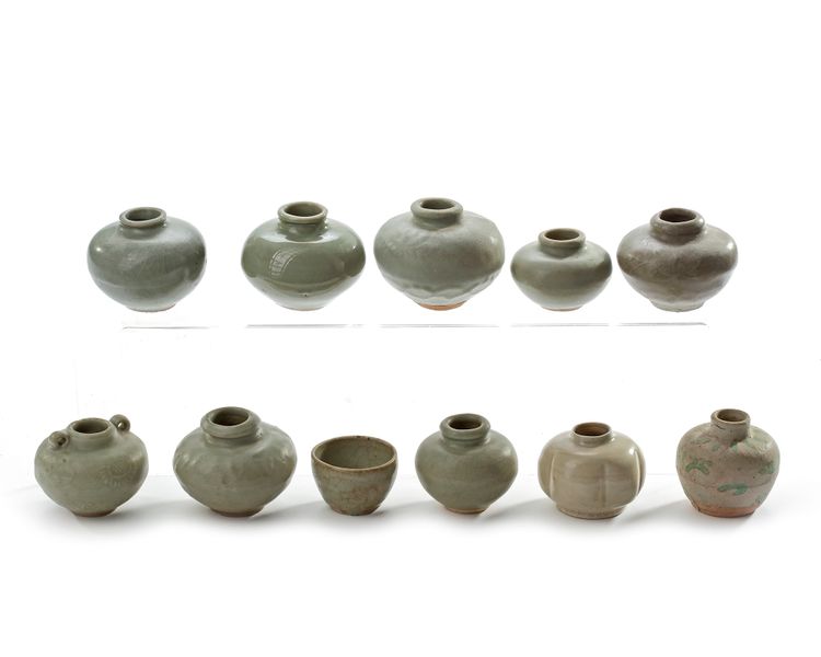 NINE SMALL CHINESE CELADON JARS AND A CUP, 13TH-14TH CENTURY