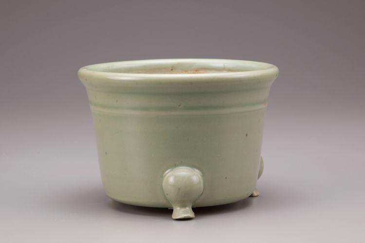 A celadon tripod censer
