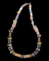 A MULTI-COLOR TRADE BEAD NECKLACE