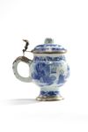 A Chinese blue and white mustard pot with European silver mounts