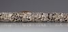 A CHINESE BONE AND SILVER PLATED CARVED OPIUM PIPE, 20TH CENTURY