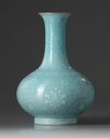A Chinese turquoise-ground slip-decorated bottle vase