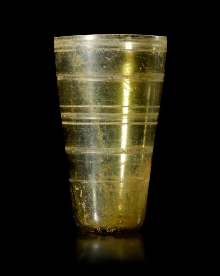 AN UMAYYAD GLASS BEAKER, NEAR EAST 7TH-8TH CENTURY