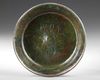 AN ACHAEMENID BRONZE LOTUS PHIALE, CIRCA 6TH-5TH CENTURY B.C.